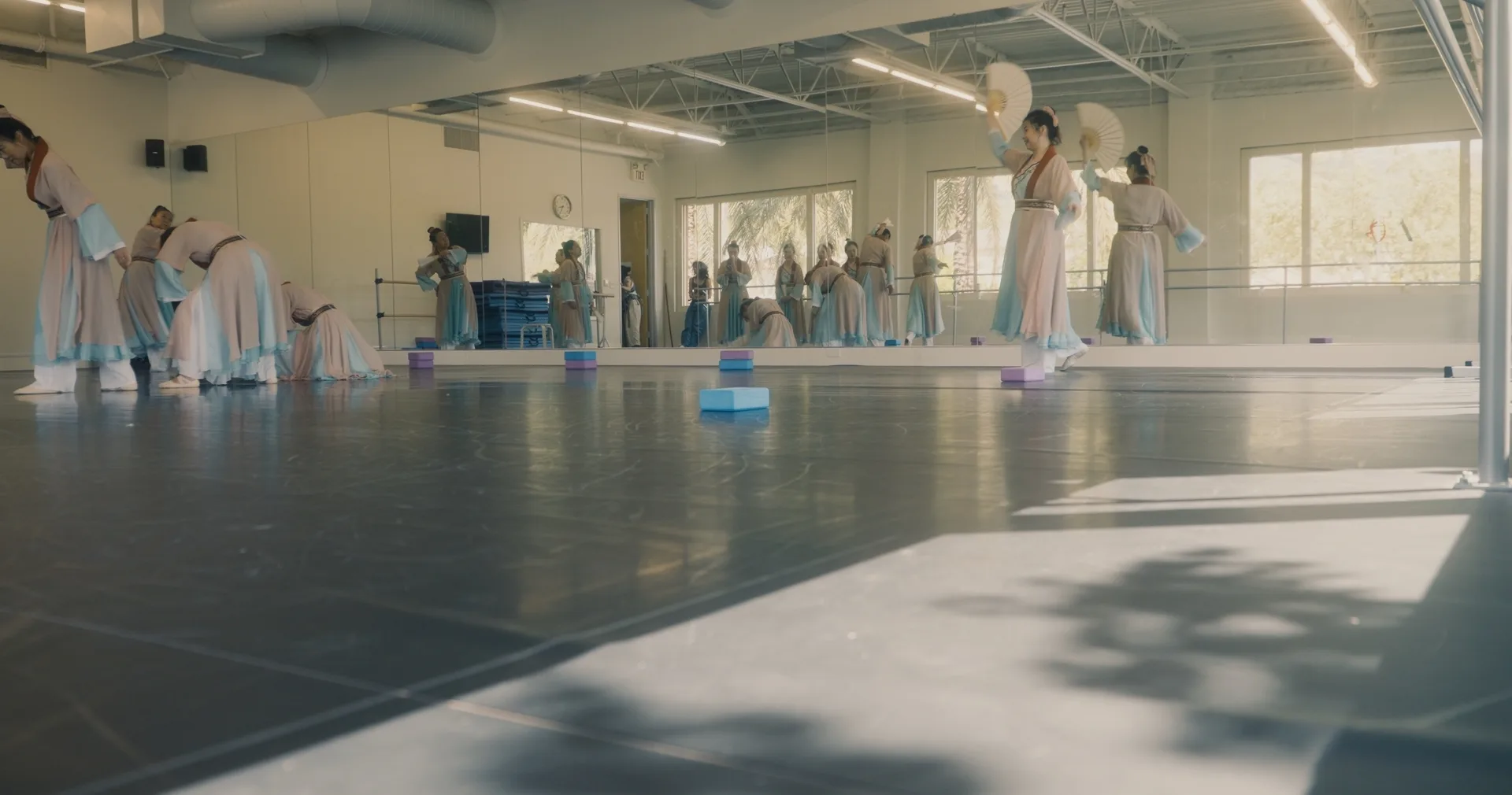 still shot from WHEN ARE YOU COMING HOME? dancers rehearse in their classroom
