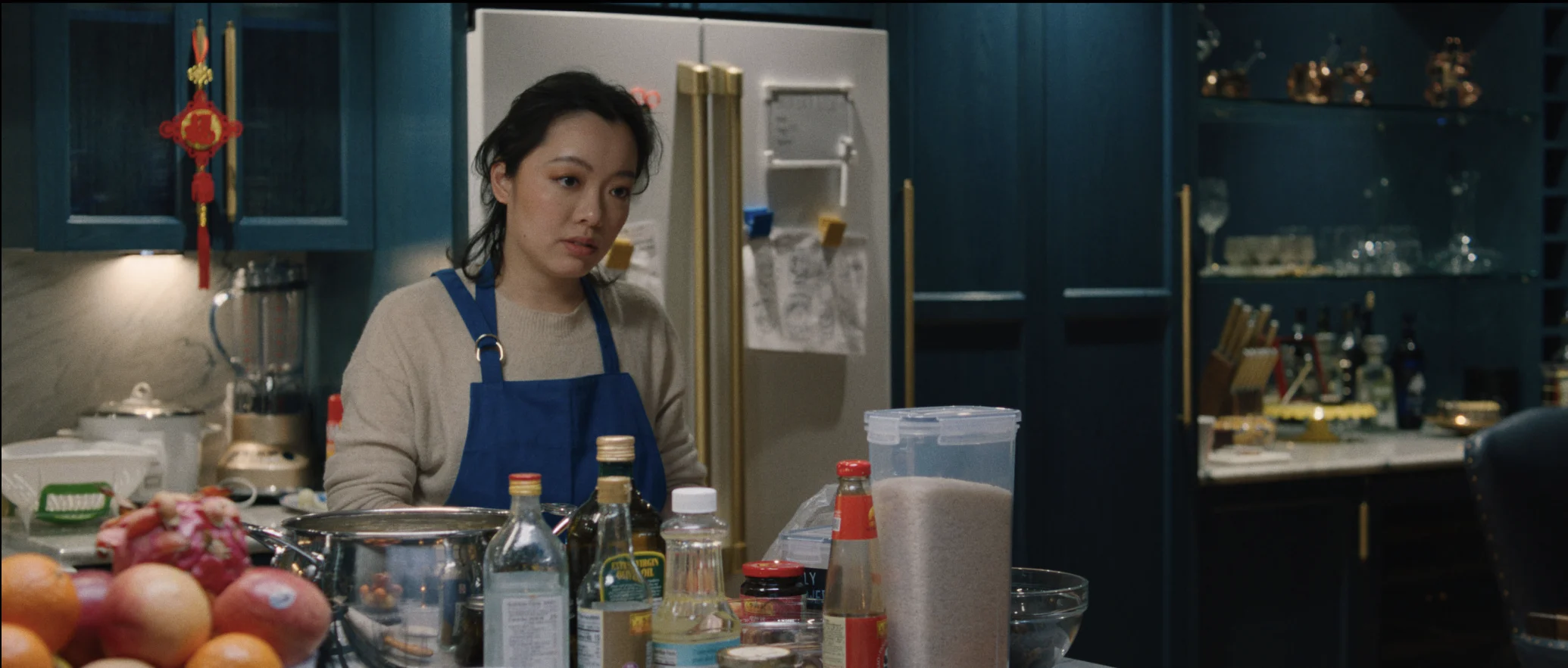 still shot from DID YOU EAT YET? Eunice stares at her mother