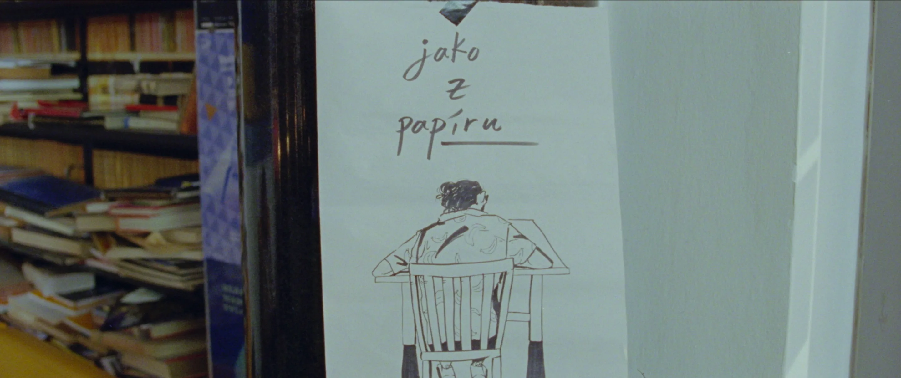 still shot from PAPERLIKE a sketch of a person sitting from behind