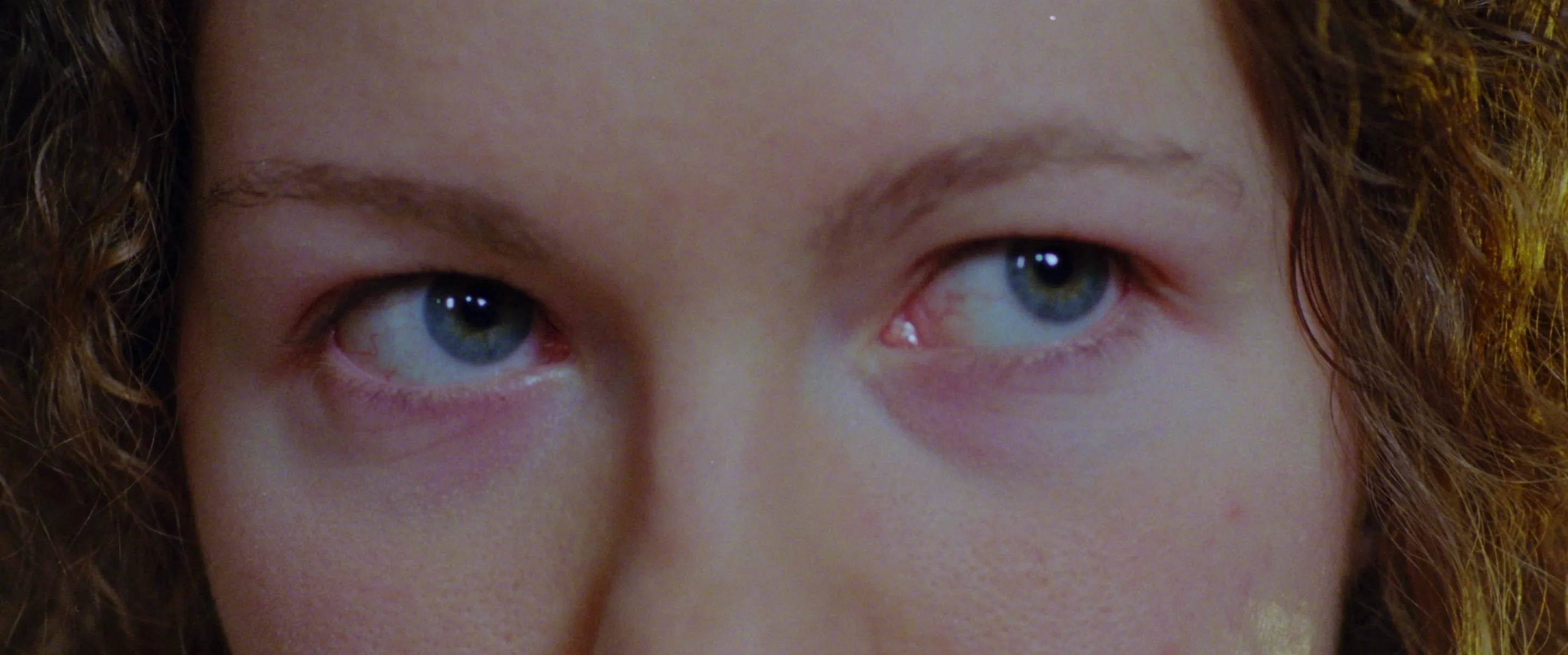 still shot from PAPERLIKE closeup of eyes glancing around